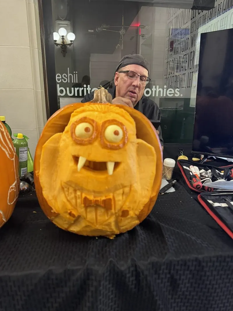 Carved pumpkin on a restaurant table at Taste of UTB